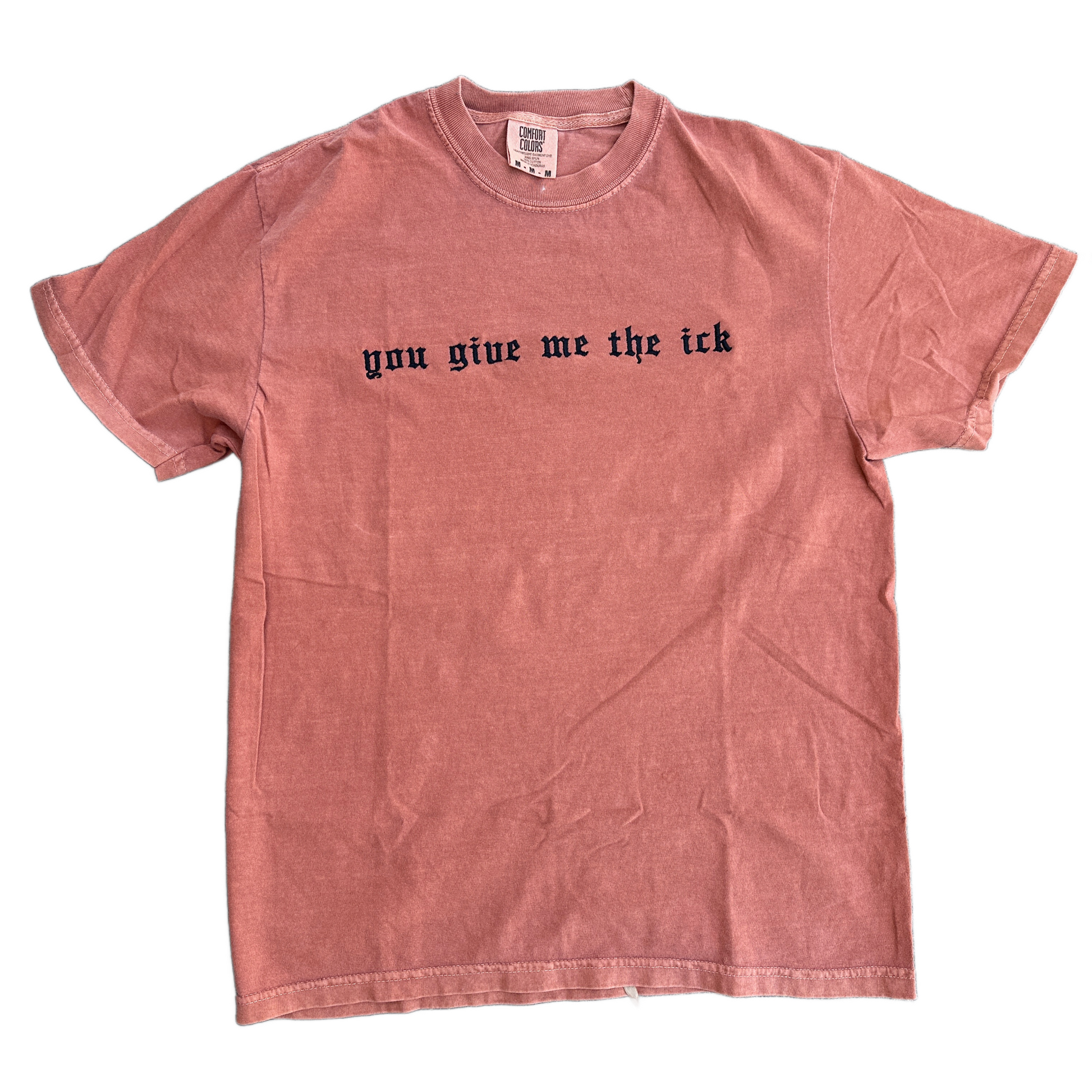 Yam Comfort Colors T-shirt featuring black embroidered Old English text across the chest that reads “you give me the ick.”