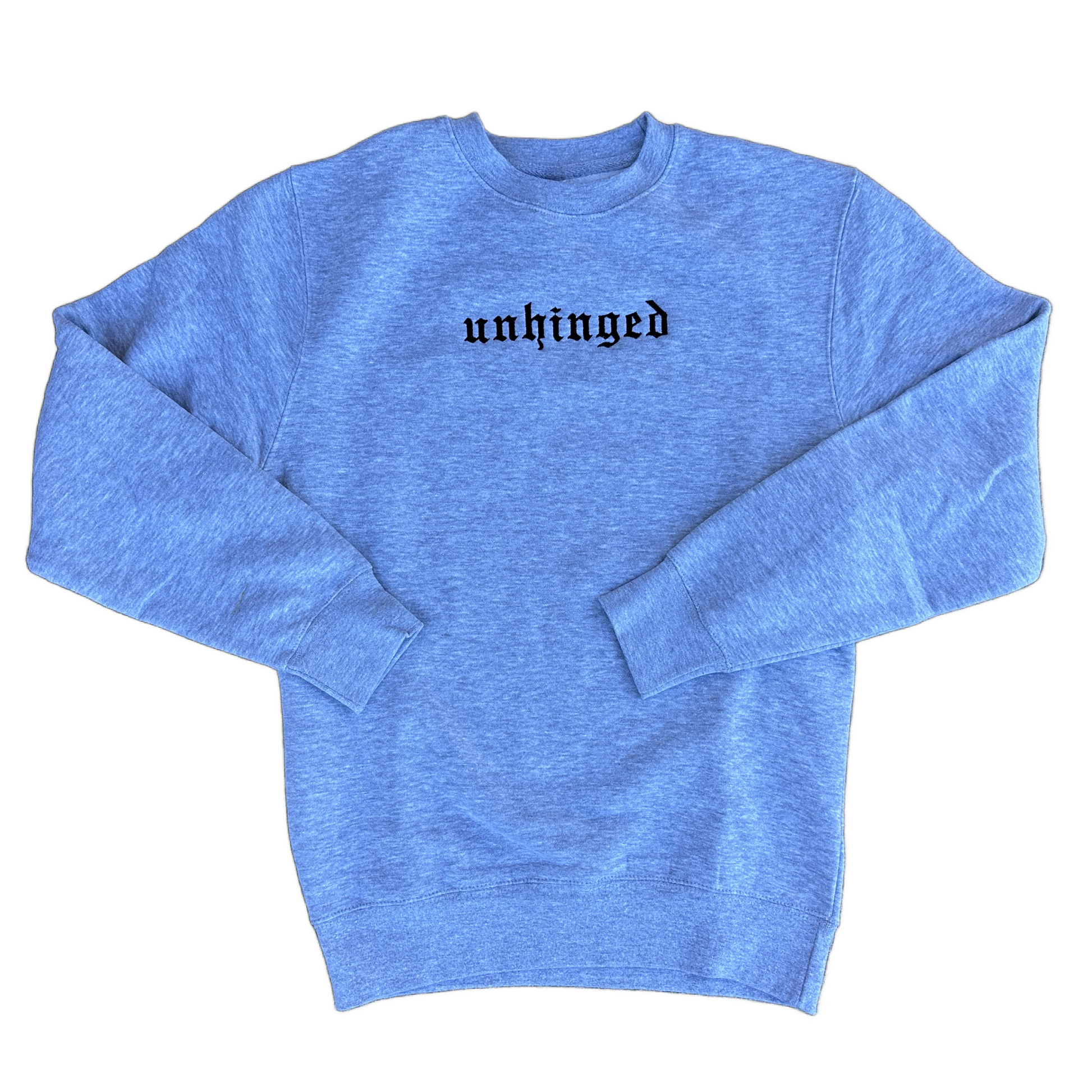 A heather gray crewneck sweatshirt with the word 'unhinged' embroidered in a black gothic font across the chest, displayed flat against a solid white background.