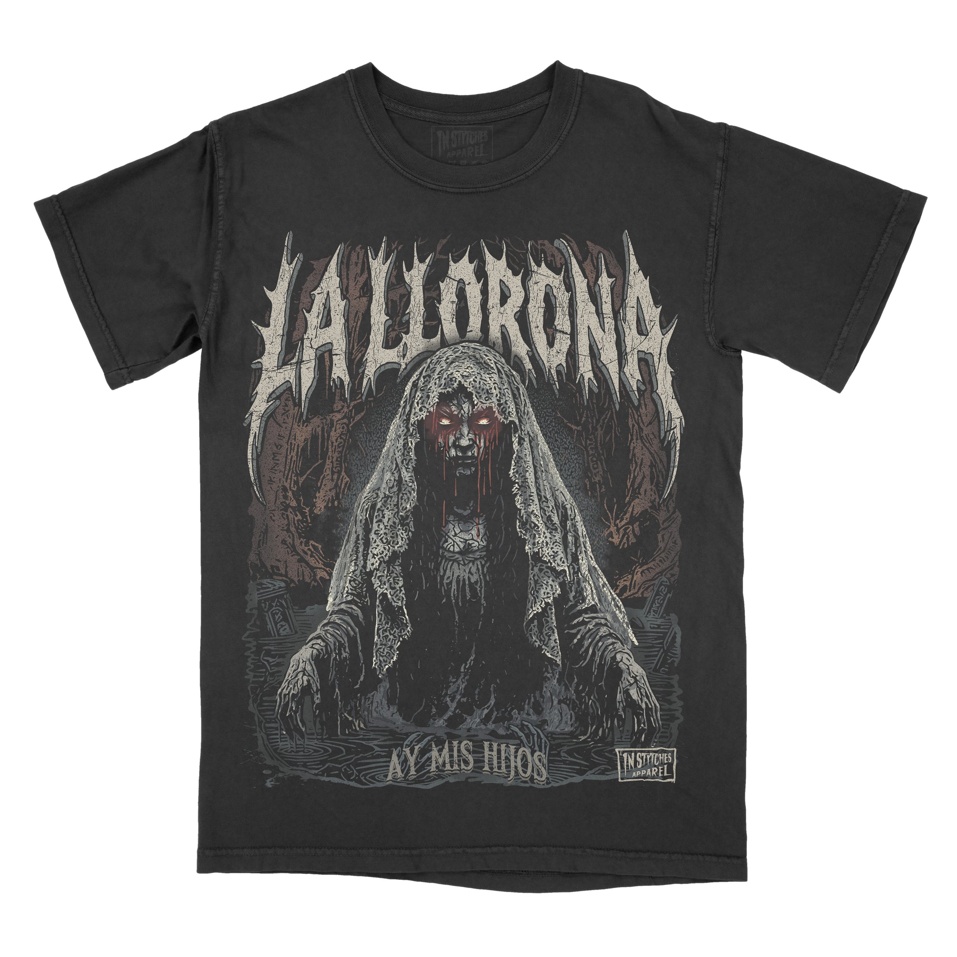 Black graphic t-shirt featuring a haunting illustration of La Llorona with glowing red eyes, lace veil, gothic typography, and dark folklore artwork.