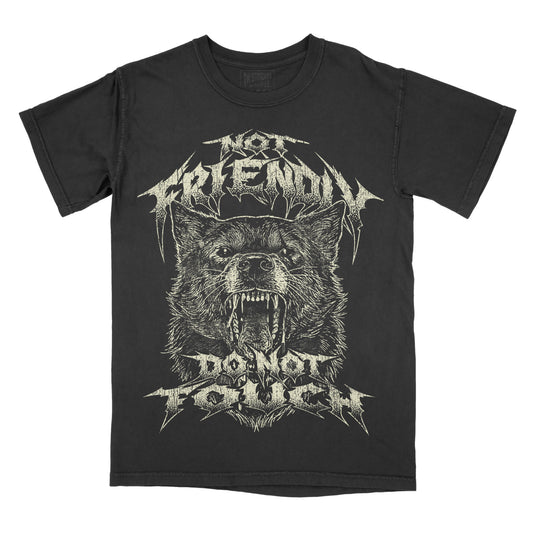 A black short-sleeve graphic t-shirt featuring a detailed white and gray illustration of a snarling wolf wearing a crown, with the text 'NOT FRIENDLY' above and 'DO NOT TOUCH' below in a jagged metal font.