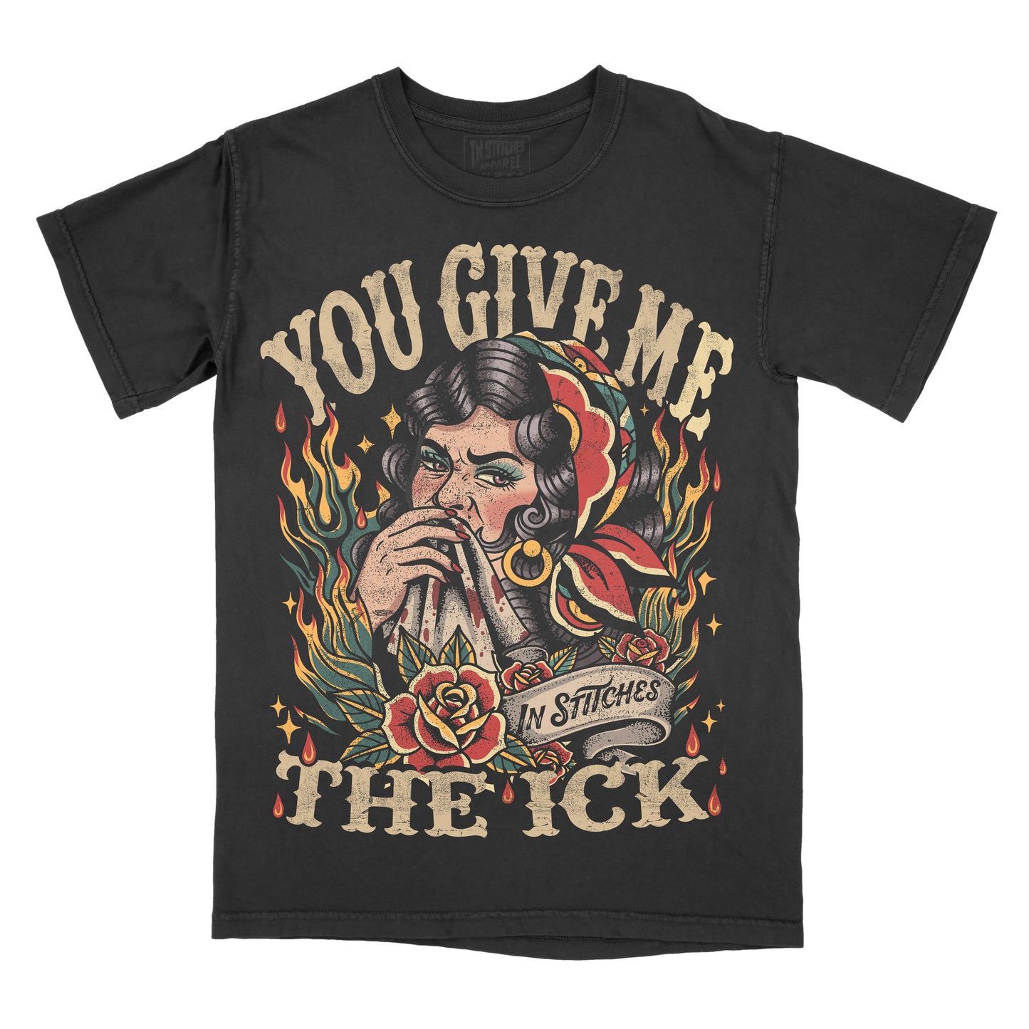 Black Comfort Colors graphic T-shirt featuring a vintage tattoo-style illustration of a woman biting a handkerchief with roses, flames, and the phrase "You Give Me the Ick" in distressed lettering.