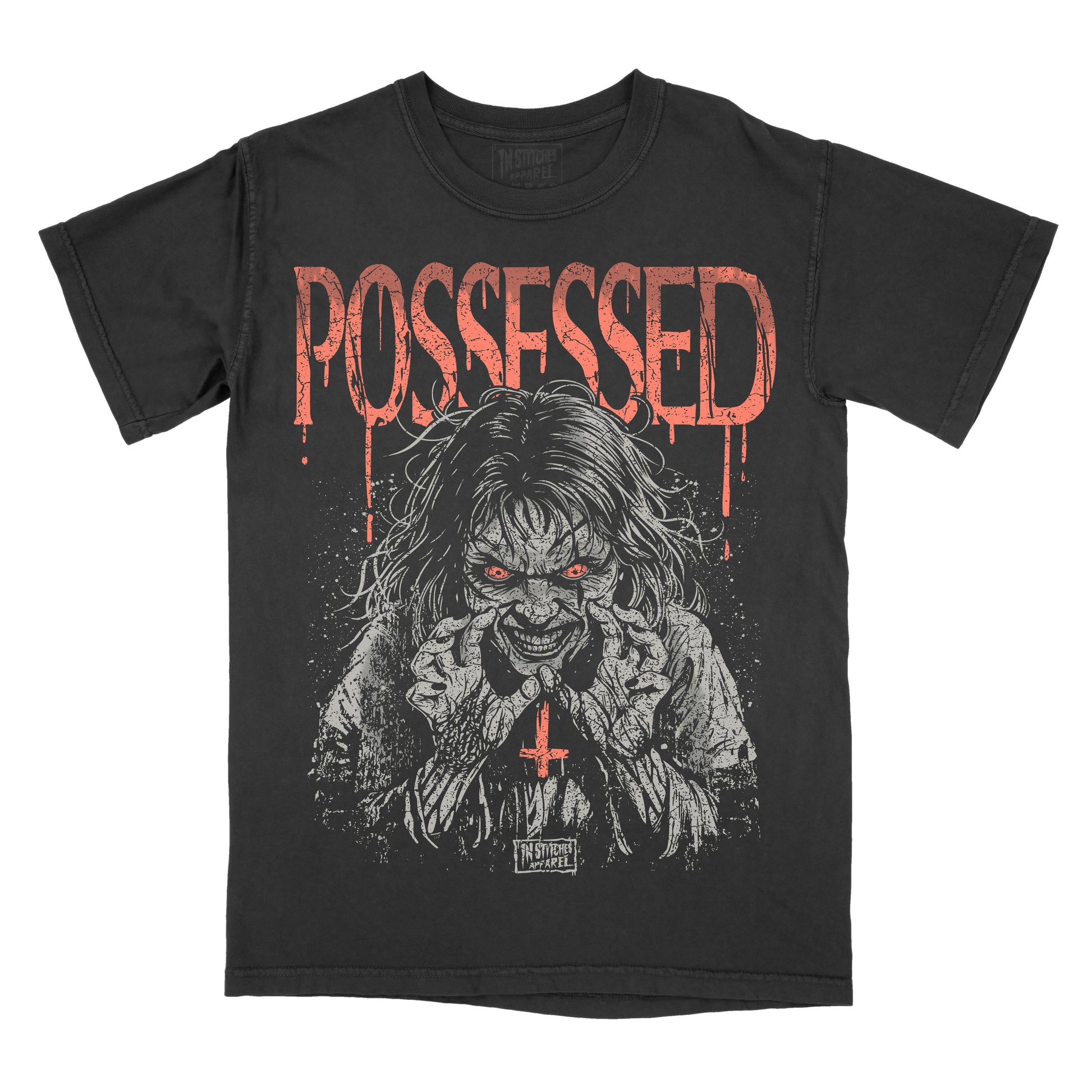 A black short-sleeve graphic t-shirt featuring a distressed red 'POSSESSED' text and a horror-themed illustration of a creepy figure with red eyes and a red cross on the chest, set against a plain white background.