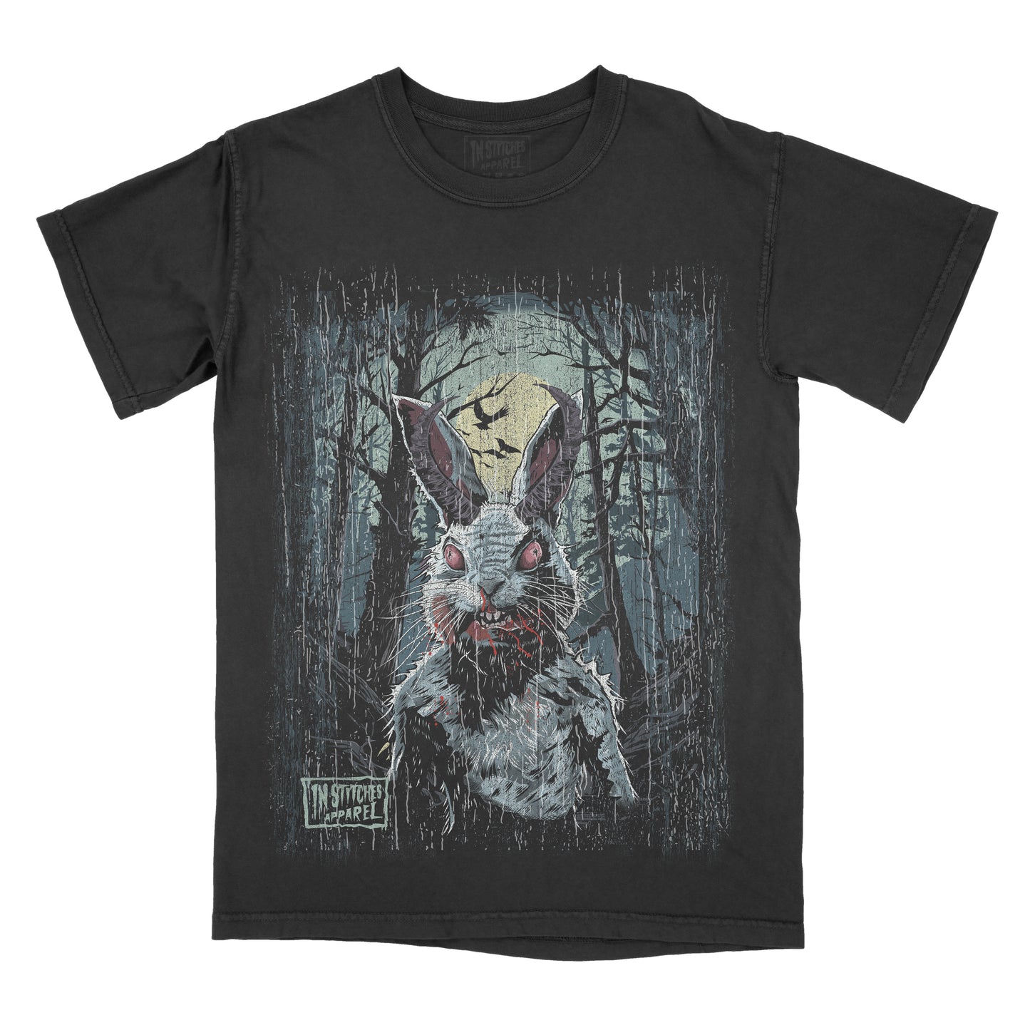 Black T-shirt featuring a creepy white rabbit with glowing red eyes and blood around its mouth standing in a dark forest. A full moon and flying bats appear in the background, creating a spooky horror scene.