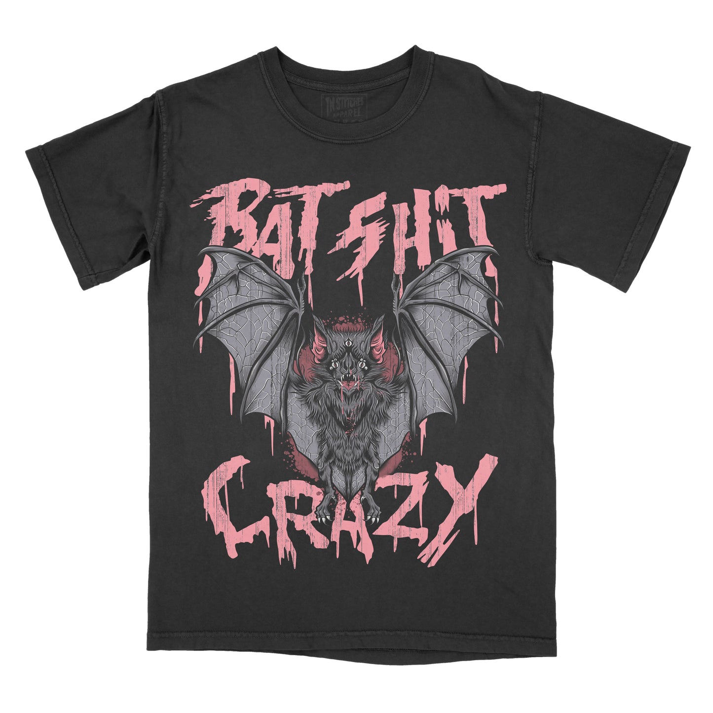 A black short-sleeve t-shirt with a graphic of a bat in the center, flanked by dripping pink text reading 'BAT SHIT' above and 'CRAZY' below, shown on a plain white background.