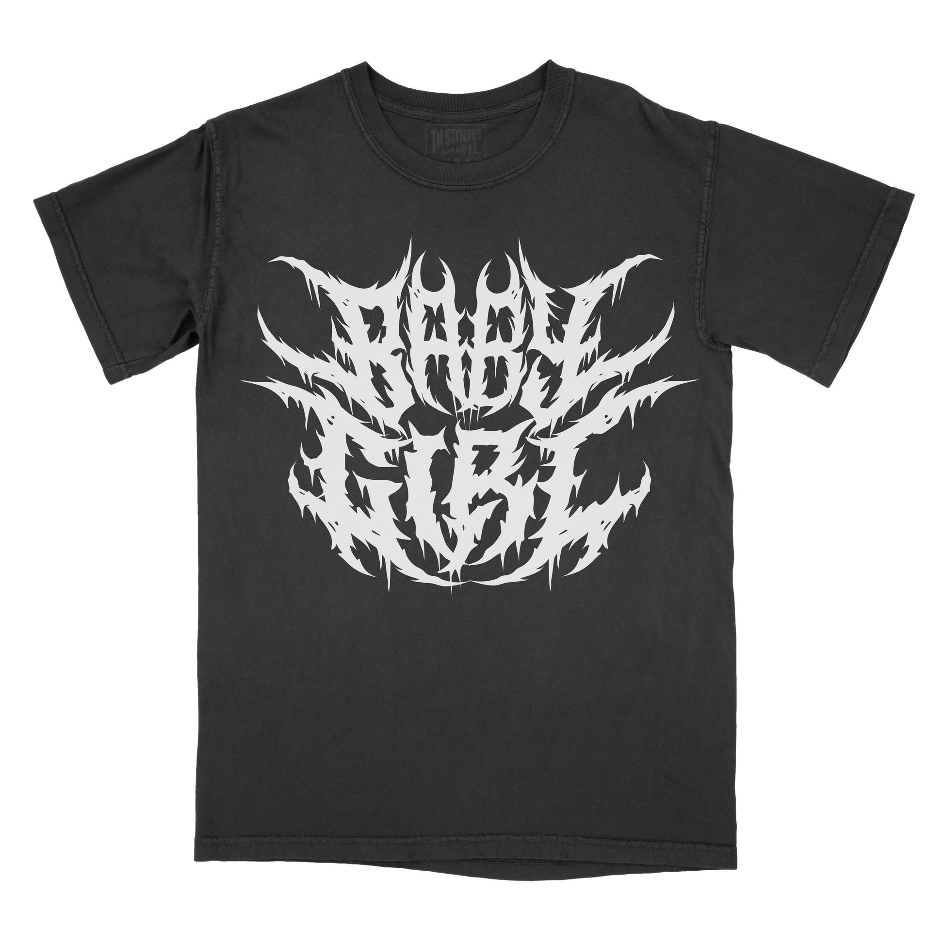 Black T-shirt featuring the words "BABY GIRL" in a white heavy metal-inspired font with jagged, mirrored lettering, sharp spikes, and distressed edges.