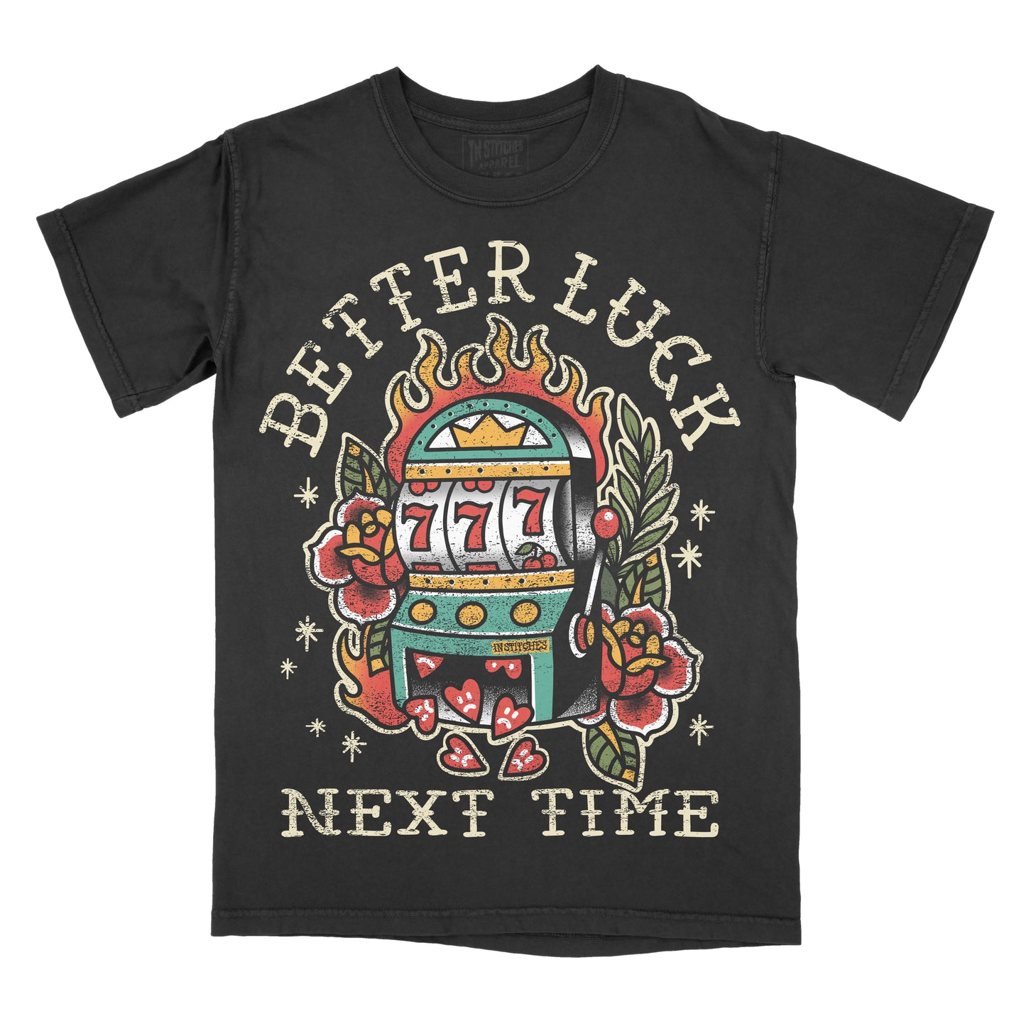A black short-sleeve t-shirt with a vintage-style tattoo-style graphic of a slot machine, roses, and the text 'BETTER LUCK NEXT TIME' on the front, shown against a plain white background.
