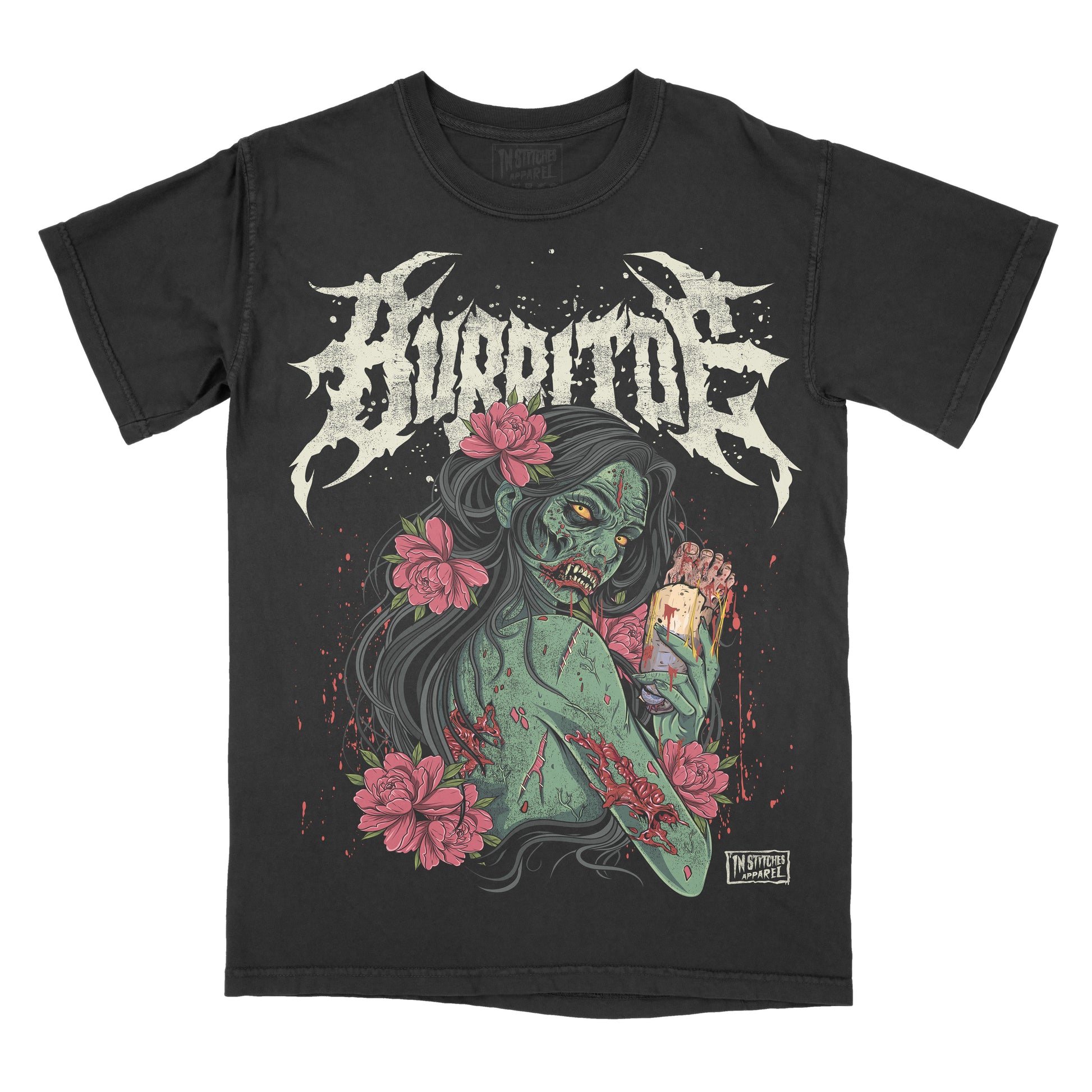 Black vintage-wash graphic T-shirt featuring a zombie girl with long black hair and pink flowers, holding a burrito with a human foot sticking out. The word "BURRITOE" appears above in a distressed metal-inspired font. Bold horror parody design with gore, floral accents, and gothic alternative style.