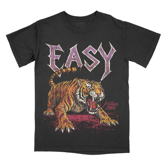 A black short-sleeve graphic t-shirt featuring a large printed design of a roaring tiger beneath the word 'EASY' in a stylized purple font.