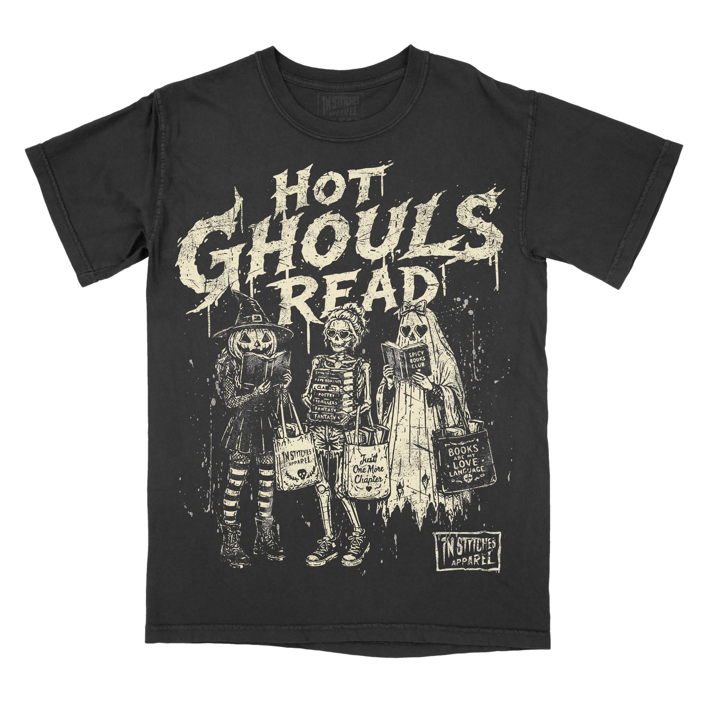 A black short-sleeve graphic t-shirt featuring the distressed white text 'HOT GHOULS READ' above three skeleton characters in Halloween costumes holding bags, with a 'In Stitches Apparel' logo in the bottom right corner.