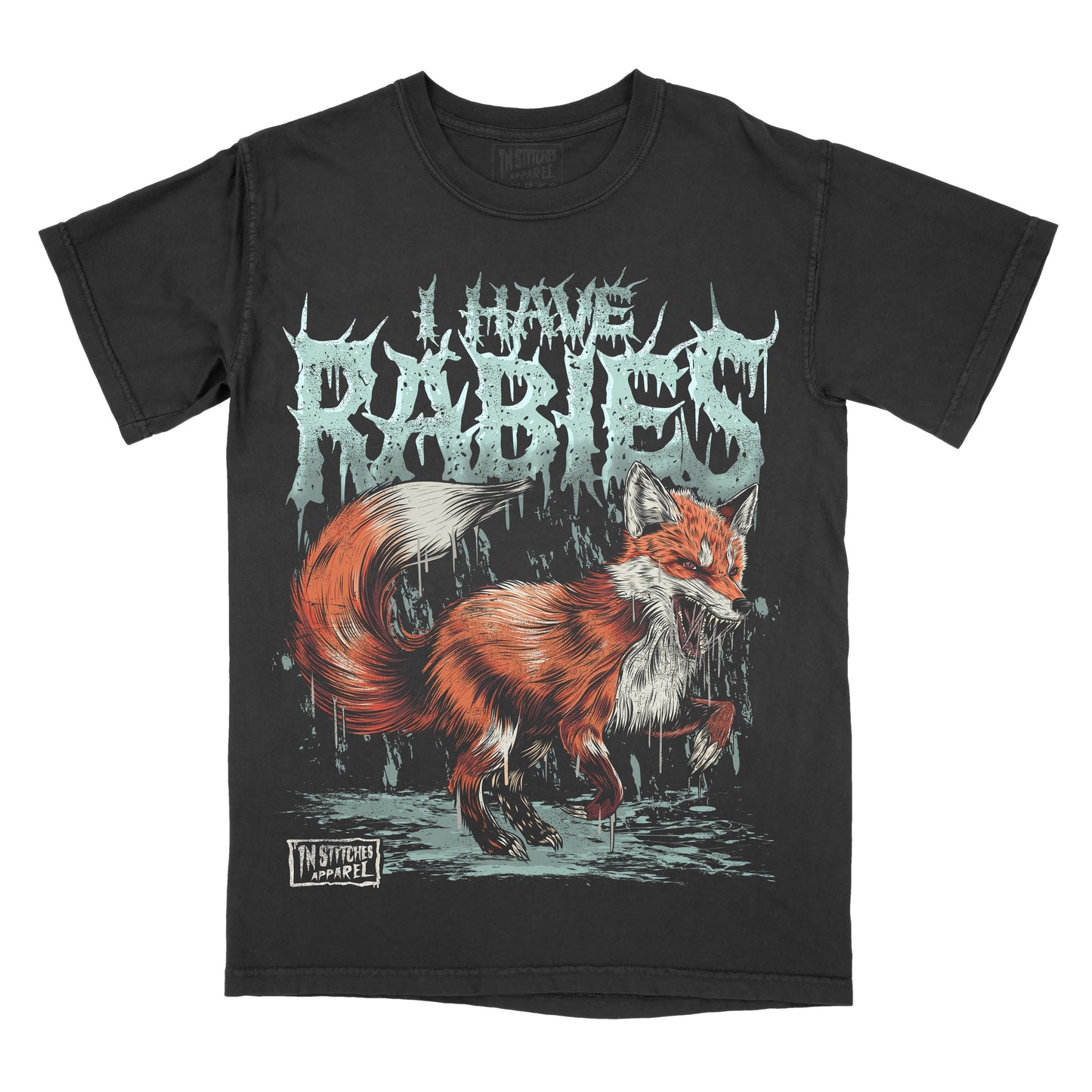 A black short-sleeve graphic t-shirt featuring a stylized red fox illustration and the text 'I HAVE RABIES' in a dripping icy font, with a small 'In Stitches Apparel' label near the bottom left of the graphic.