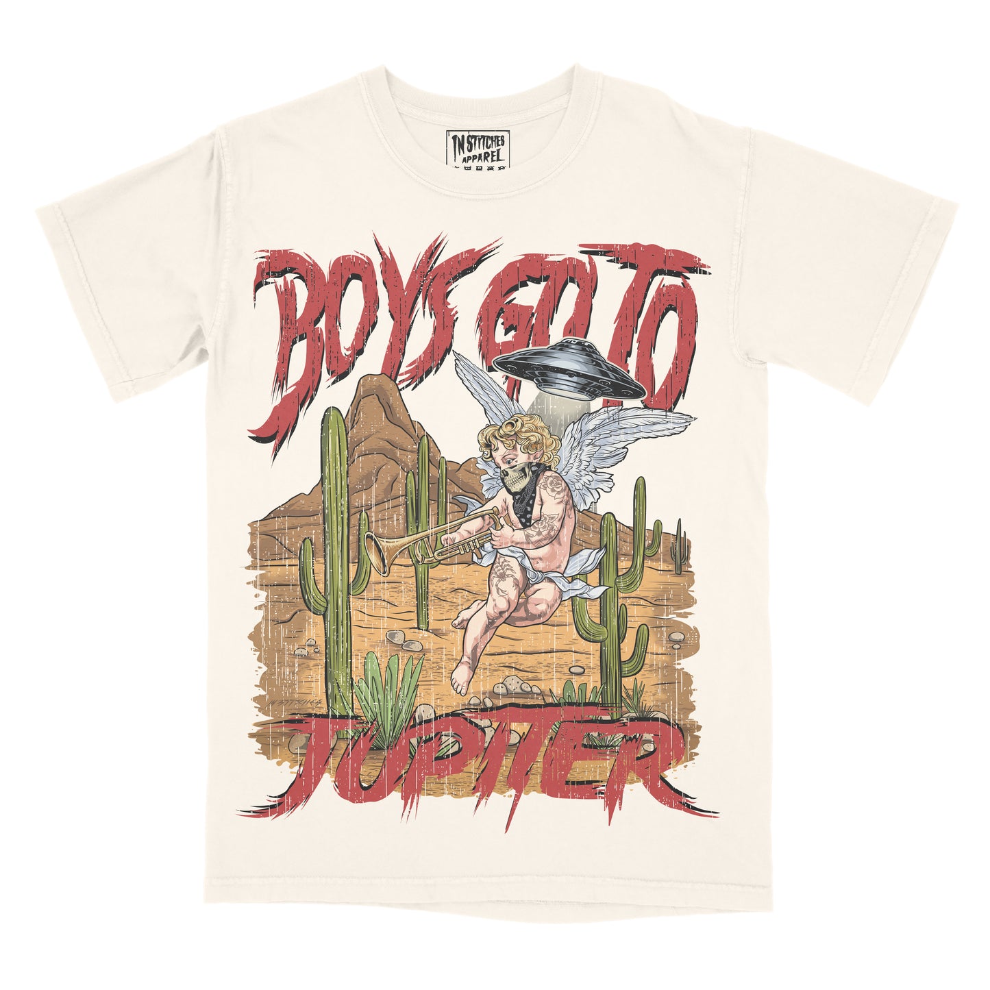 An off-white short-sleeve graphic t-shirt featuring a cartoon illustration of a winged figure riding a horse with cacti, with the words 'BOYS go TO JUPITER' in a red distressed font.