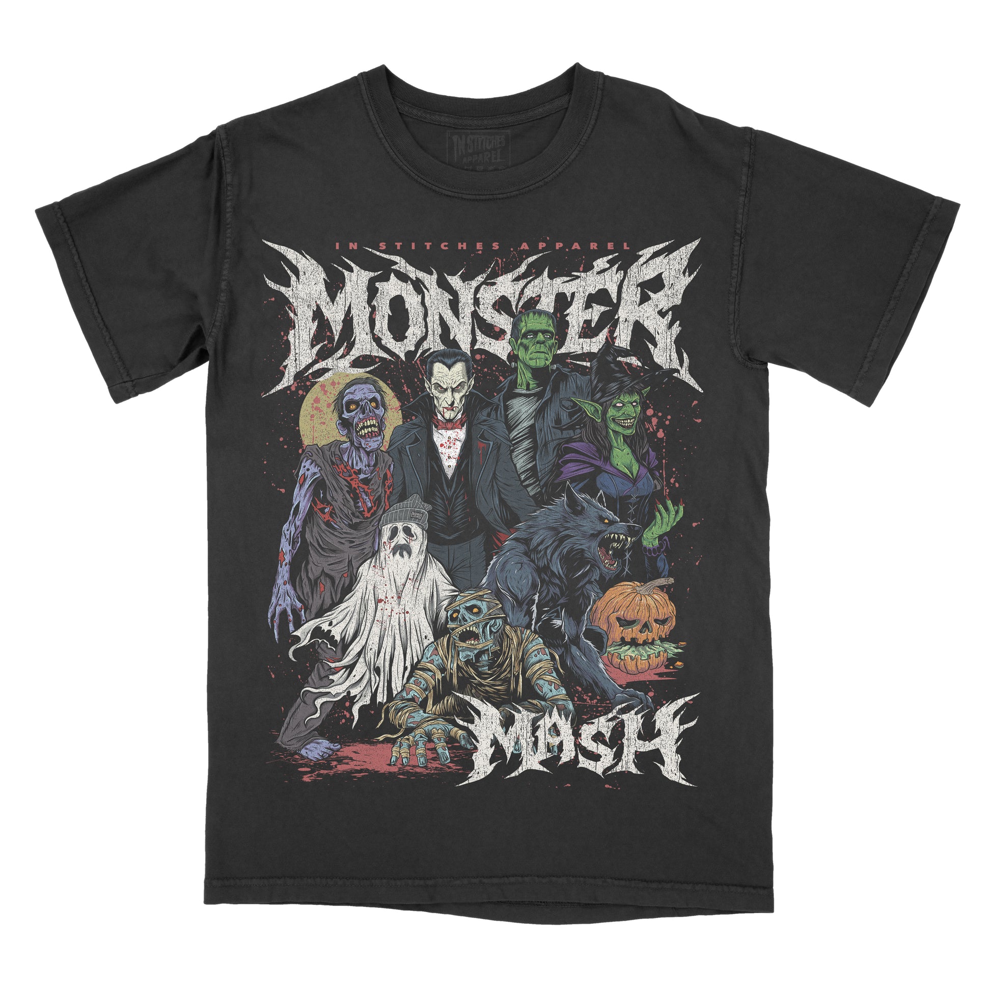 Black vintage-style t-shirt featuring bold gothic lettering that reads ‘Monster Mash.’ The design shows a group of classic horror characters including a zombie, vampire, Frankenstein’s monster, witch, ghost, mummy, werewolf, and a carved jack-o’-lantern. The artwork uses muted tones with green, purple, orange, and red accents in a distressed, horror-themed illustration. ‘In Stitches Apparel’ branding appears above the design.