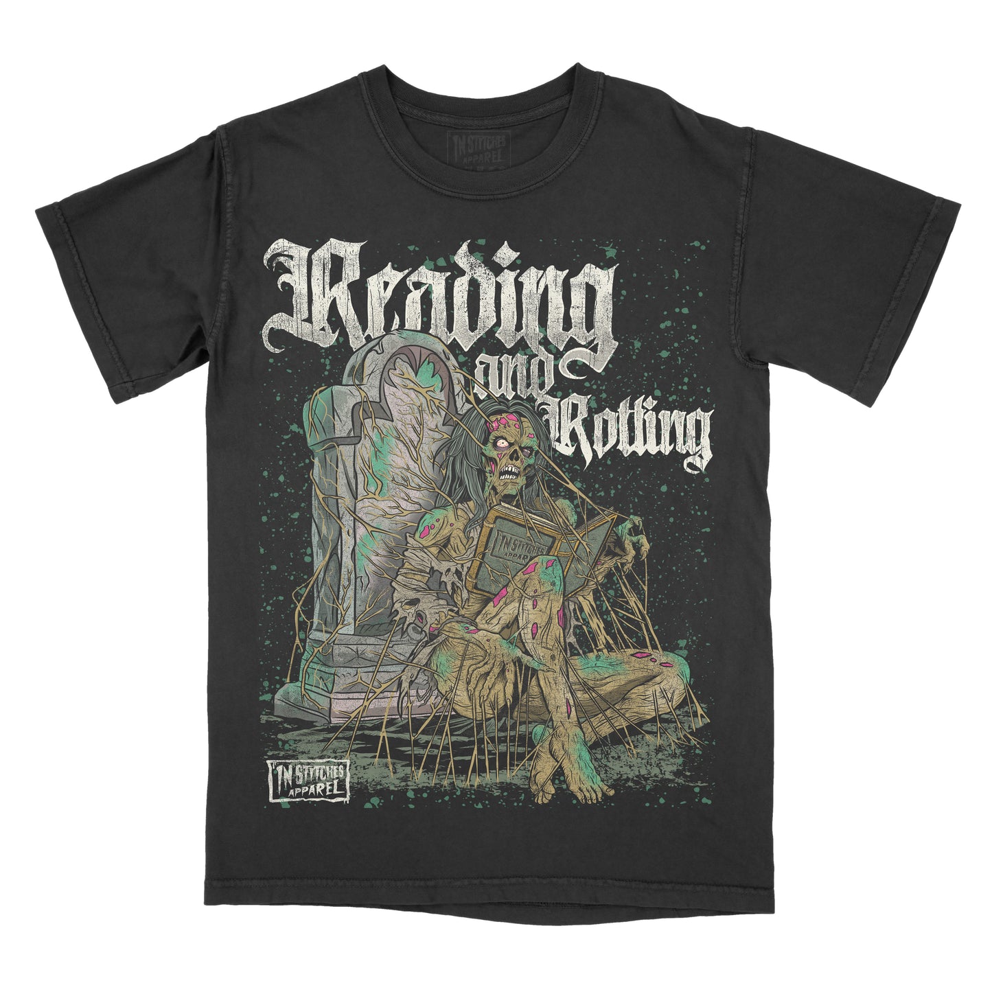 Black vintage-style t-shirt featuring gothic lettering that reads ‘Reading and Rotting.’ The design shows a decaying zombie-like figure slumped against a tombstone, pierced with needles and surrounded by vines. The artwork uses muted green, tan, and pink tones with a distressed, horror-inspired aesthetic. ‘In Stitches Apparel’ logo appears on the design.