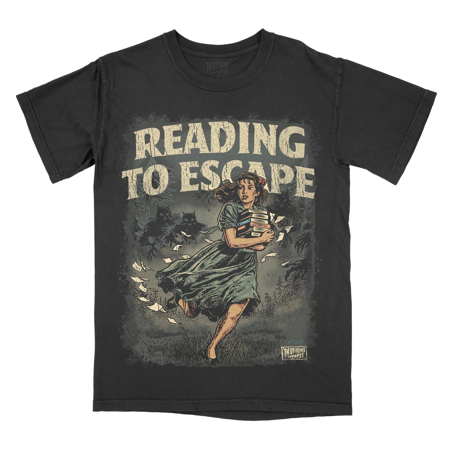 Black garment-dyed graphic t-shirt featuring the phrase "Reading to Escape" with an original vintage-inspired illustration of a woman carrying books while fleeing shadowy monsters through a dark forest.