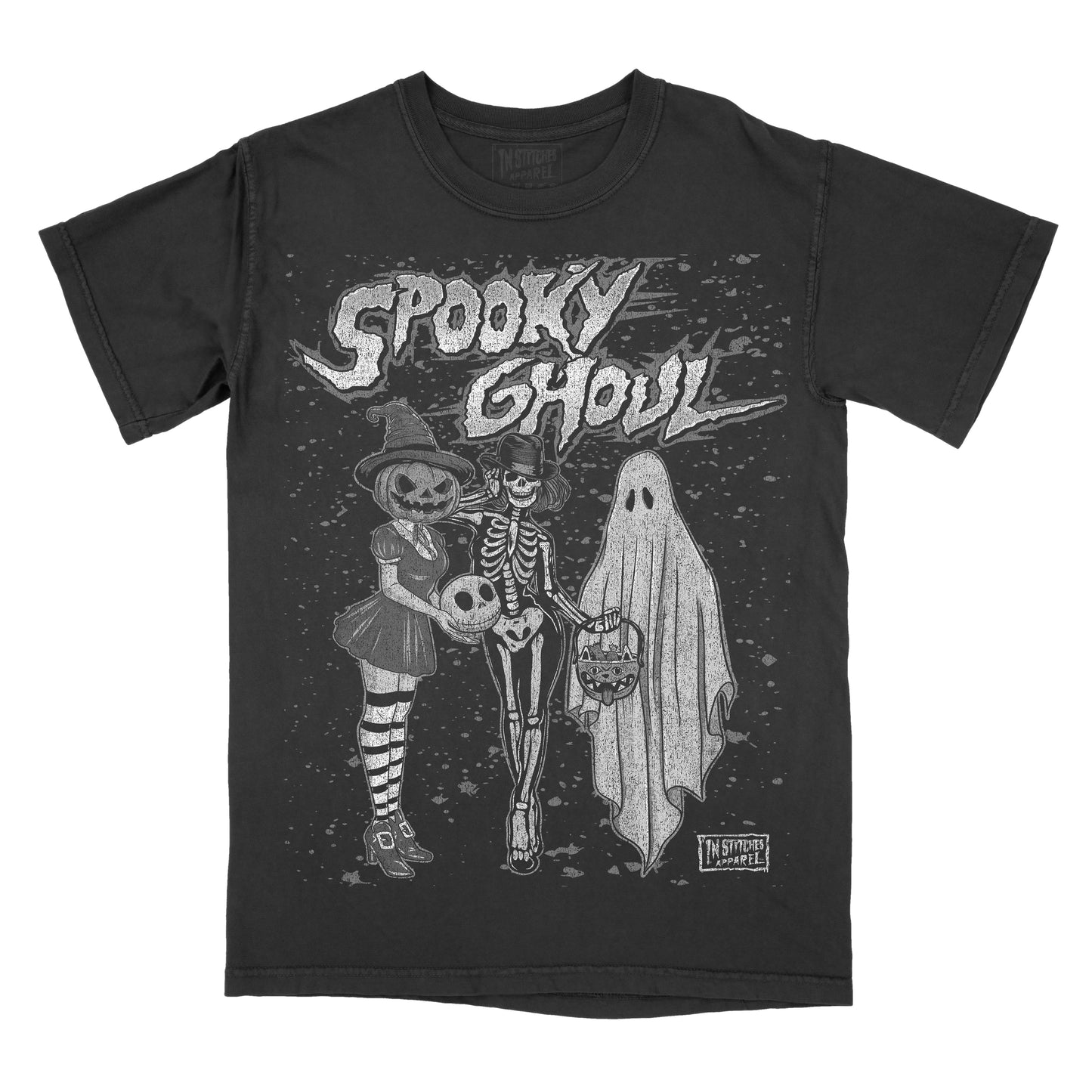 A black short-sleeve graphic t-shirt featuring a Halloween-themed illustration of a skeleton, a jack-o'-lantern, and a ghost with the text 'Spooky Ghoul' across the chest.