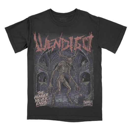 Black garment-dyed graphic t-shirt featuring an original Wendigo illustration with antlers, gothic typography, and a haunted cathedral backdrop inspired by folklore.