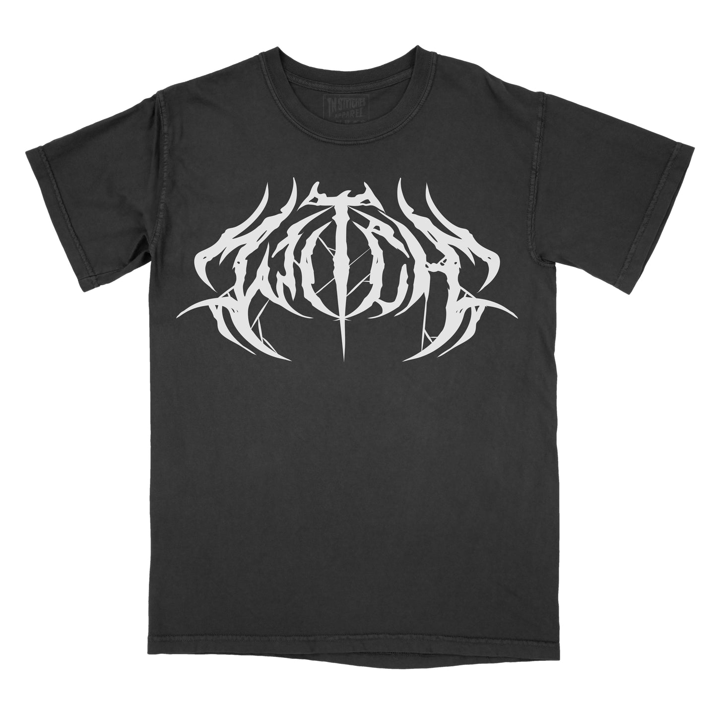 Black T-shirt featuring the word "WITCH" in a white heavy metal-inspired font with mirrored, jagged lettering, pointed spikes, and subtle spiderweb details.
